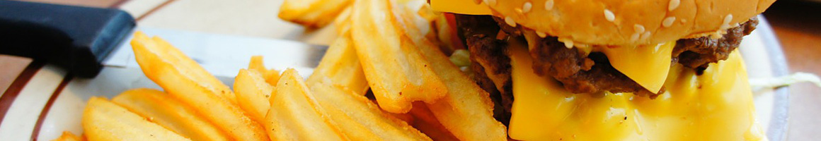 Eating Burger at Betty Burgers restaurant in Santa Cruz, CA.